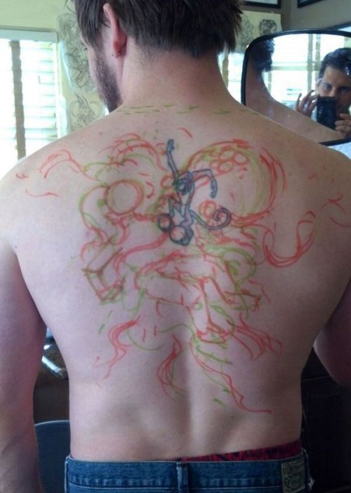 Отличное исправление неудачной татуировки (4 фото)