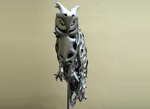 Скульптуры из колпаков на колёса (25 фото) Скульптуры из колпаков на колёса (25 фото)