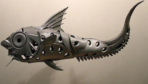 Скульптуры из колпаков на колёса (25 фото) Скульптуры из колпаков на колёса (25 фото)